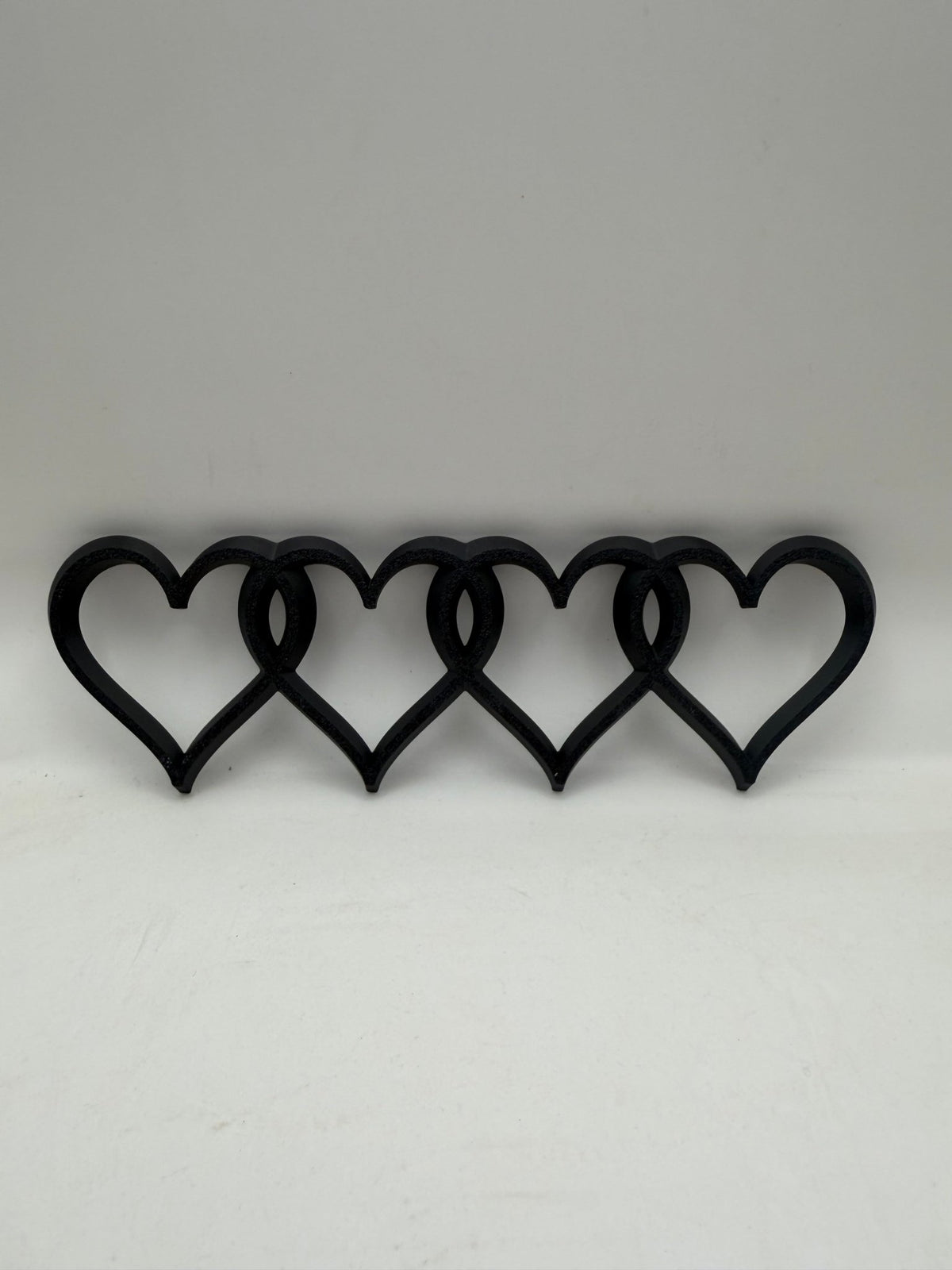 Emblemă Audi cu 4 Inimioare – Logo Decorativ 3D pentru Portbagaj, 190 × 60 mm - Auto-3D Romania